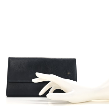 CHANEL Goatskin Camellia Embossed Flap Wallet Black