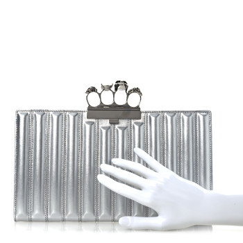 ALEXANDER MCQUEEN Metallic Calfskin Quilted Four Ring Knuckle Flat Clutch Silver ALEXANDER MCQUEEN Metallic Calfskin Quilted Four Ring Knuckle Flat Clutch Silver