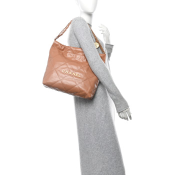 CHANEL Shiny Calfskin Quilted Small Chanel 22 Beige